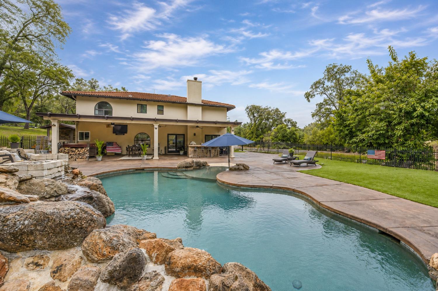 3340 Garden Bar Road Lincoln, CA 95648 - Photo 4 of 56 a swimming pool with outdoor seating and garden