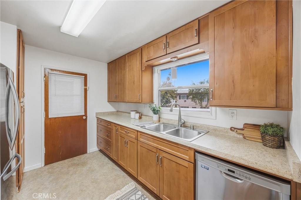 186 North Center Place Redlands, CA 92373 - Photo 15 of 28 a kitchen with a sink and cabinets