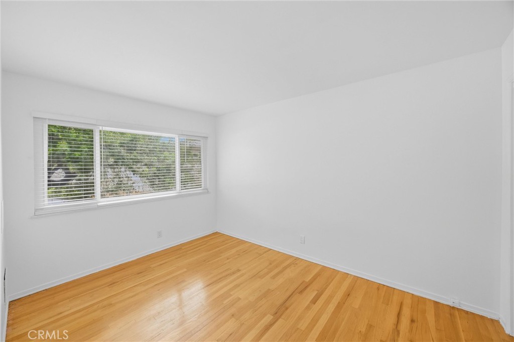 186 North Center Place Redlands, CA 92373 - Photo 18 of 28 a view of empty room with wooden floor