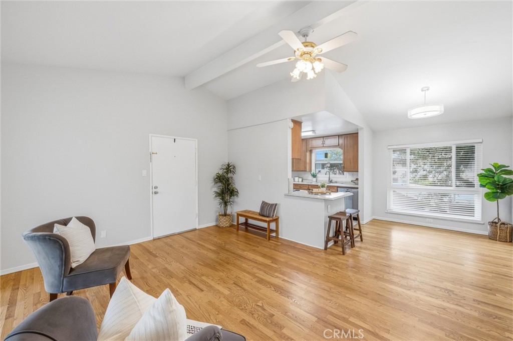 186 North Center Place Redlands, CA 92373 - Photo 6 of 28 a bedroom with furniture and a chandelier