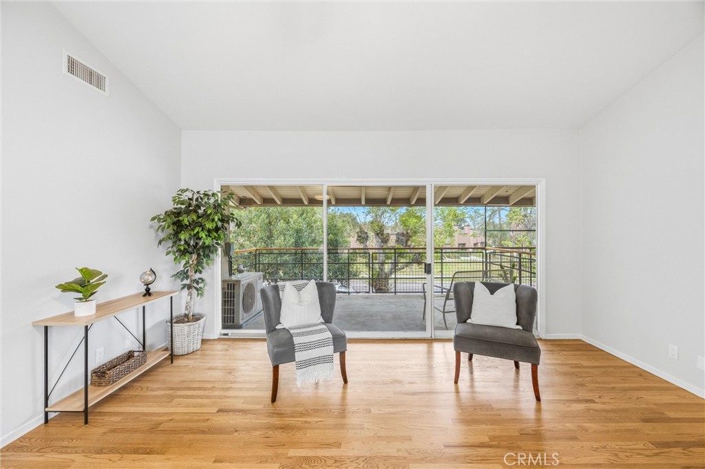 186 North Center Place Redlands, CA 92373 - Photo 7 of 28 a living room with furniture and a wooden floor