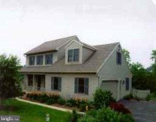 8 Pewter Drive Lititz, PA 17543 - Photo 1 of 1 a front view of a house with garden