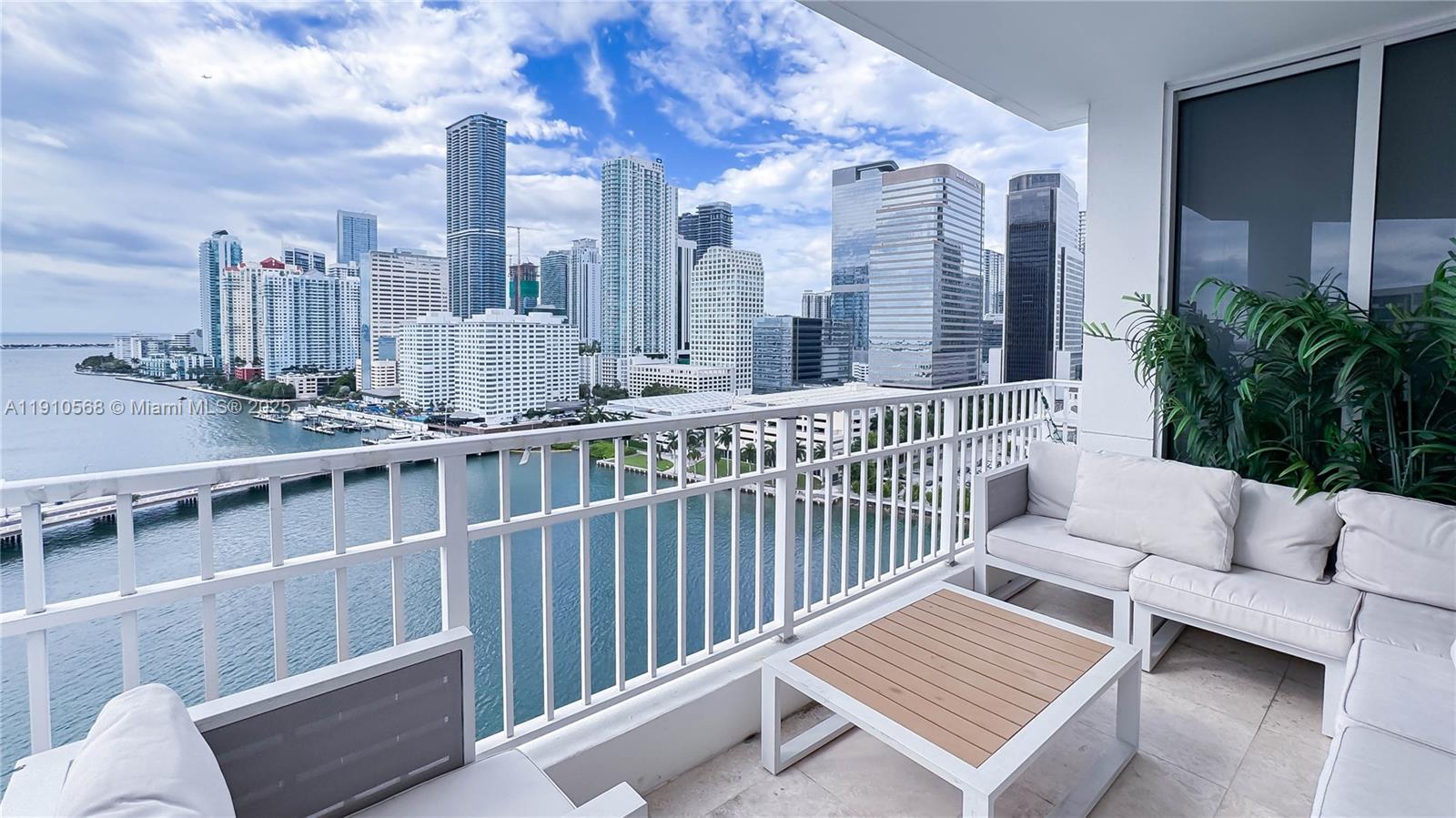 701 Brickell Key Boulevard, Unit 1912 Miami, FL 33131 - Photo 4 of 67 a view of a balcony with couch