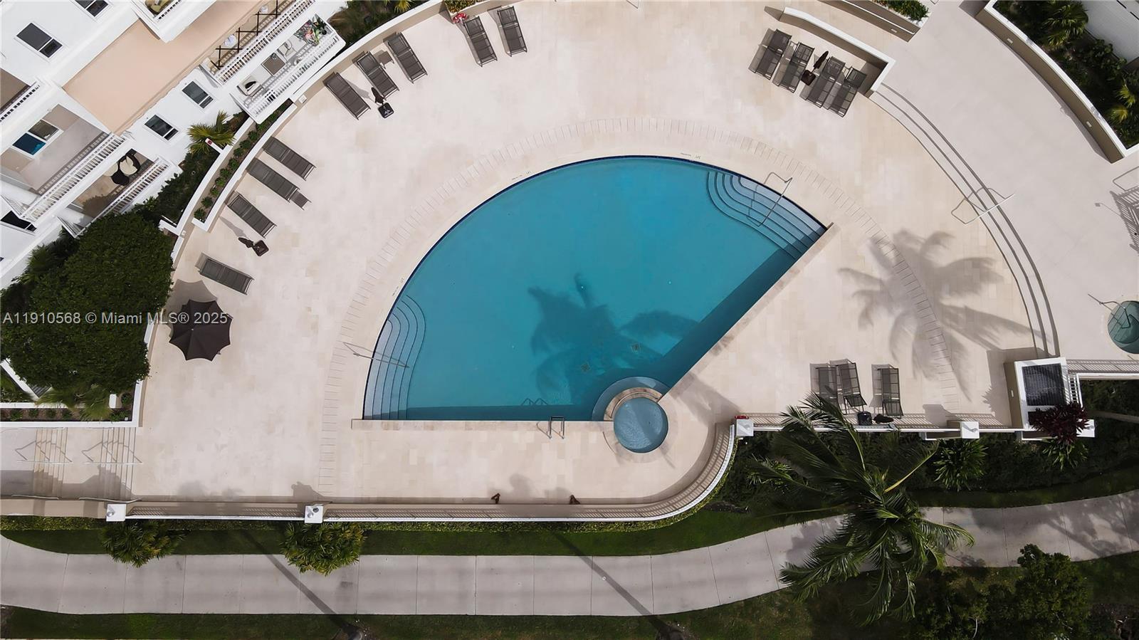 701 Brickell Key Boulevard, Unit 1912 Miami, FL 33131 - Photo 41 of 67 an aerial view of a house with swimming pool and outdoor seating