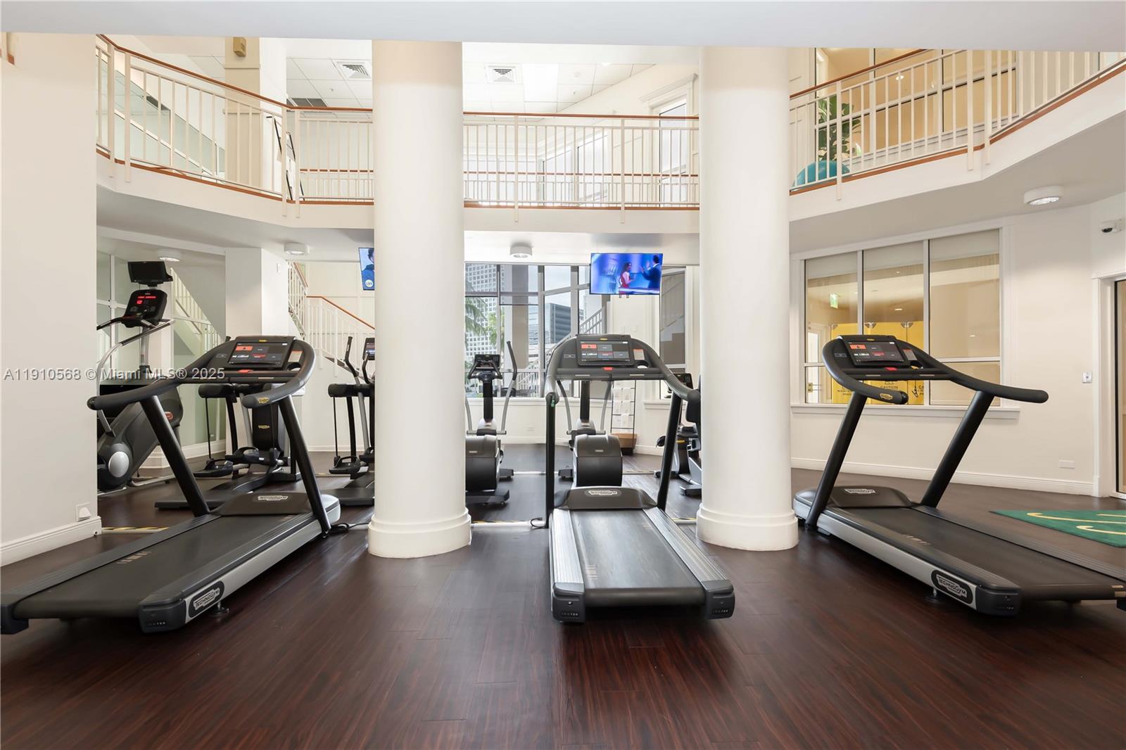 701 Brickell Key Boulevard, Unit 1912 Miami, FL 33131 - Photo 53 of 67 a view of a room with gym equipment