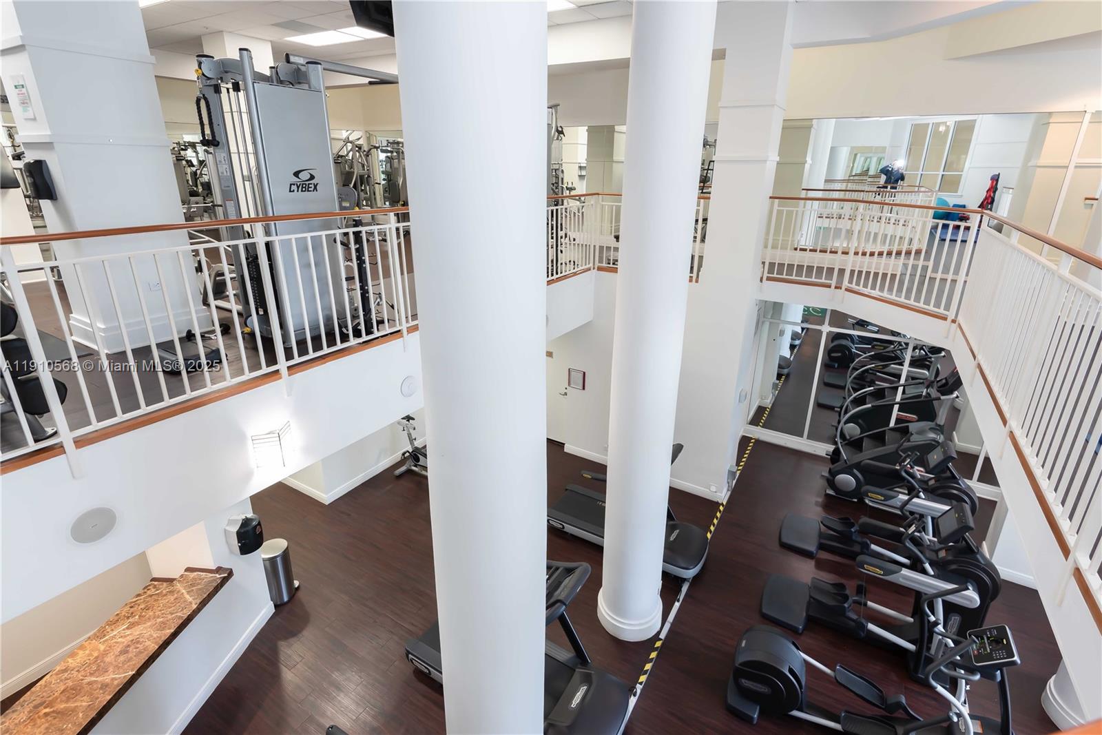 701 Brickell Key Boulevard, Unit 1912 Miami, FL 33131 - Photo 54 of 67 wooden floor in a hall with wooden floor and windows