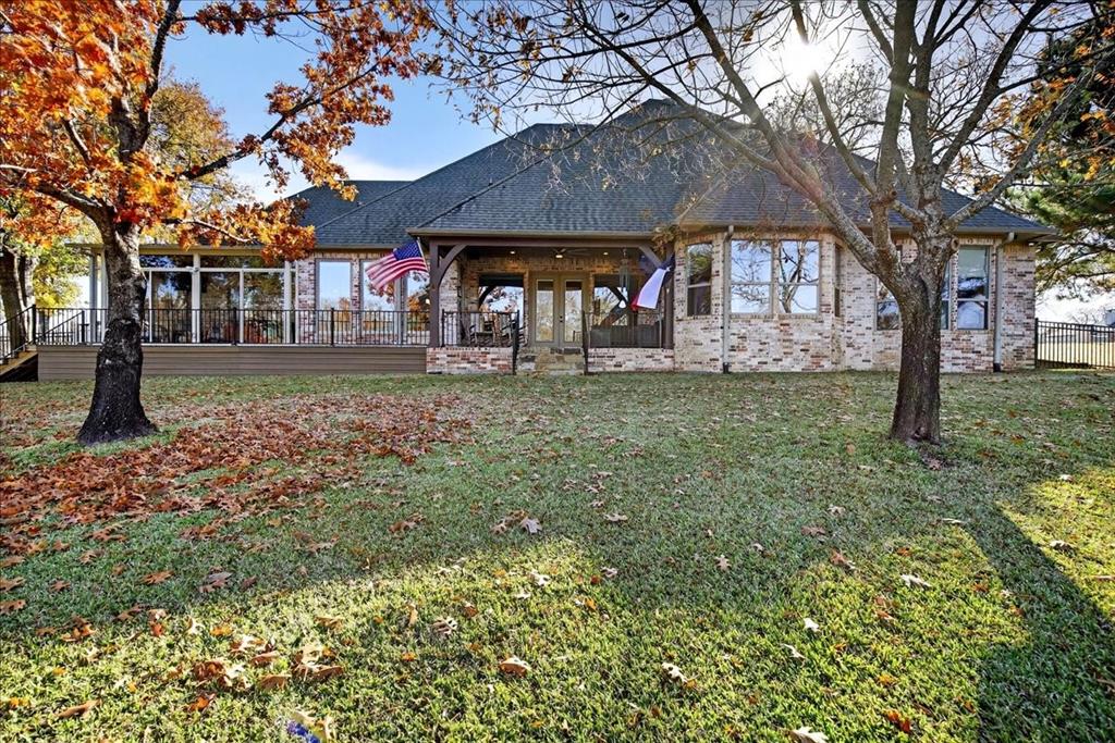 113 Adison Lane Mabank, TX 75156 - Photo 29 of 38 a front view of a house with garden