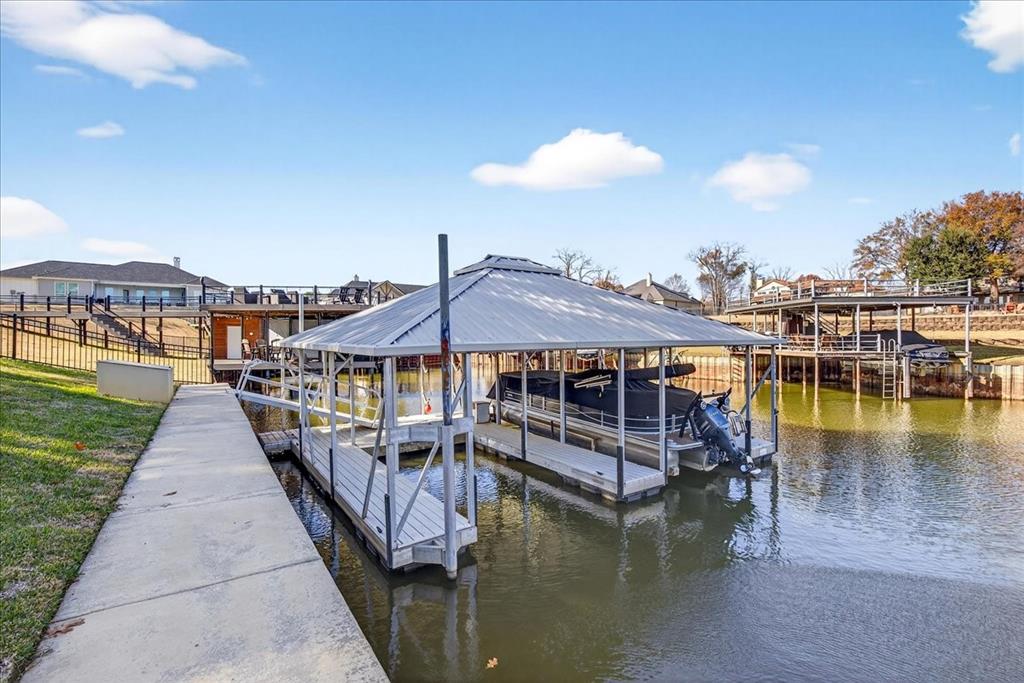 113 Adison Lane Mabank, TX 75156 - Photo 30 of 38 a view of a house with pool and ocean view