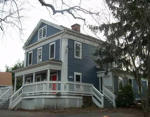 25 Strobel Road Trumbull, CT 06611 - Photo 1 of 1 a front view of a house with iron fence