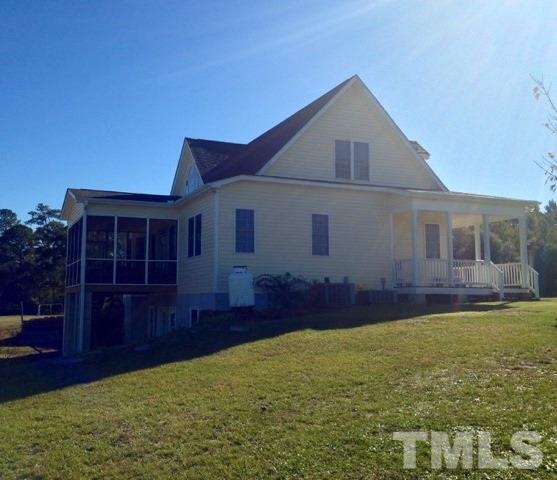 4678 Elevation Road Benson, NC 27504 - Photo 12 of 21 front view of a house with a yard