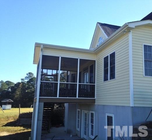 4678 Elevation Road Benson, NC 27504 - Photo 16 of 21 a view of small house with a window