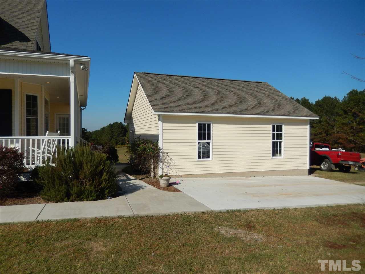 4678 Elevation Road Benson, NC 27504 - Photo 19 of 21 a house view with a outdoor space