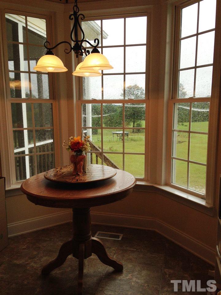 4678 Elevation Road Benson, NC 27504 - Photo 5 of 21 a view of a workspace with a window
