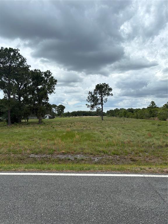 1700 West Frostproof Road Frostproof, FL 33843 - Photo 10 of 11 a view of a field with an ocean