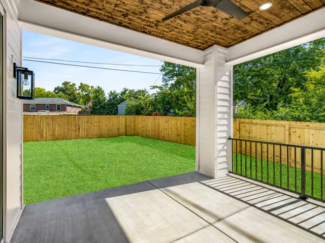 a view of backyard with green space