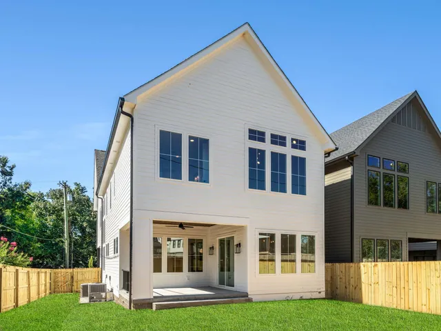 a view of house with yard