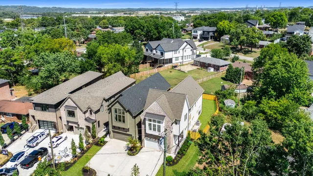 an aerial view of a house with a garden