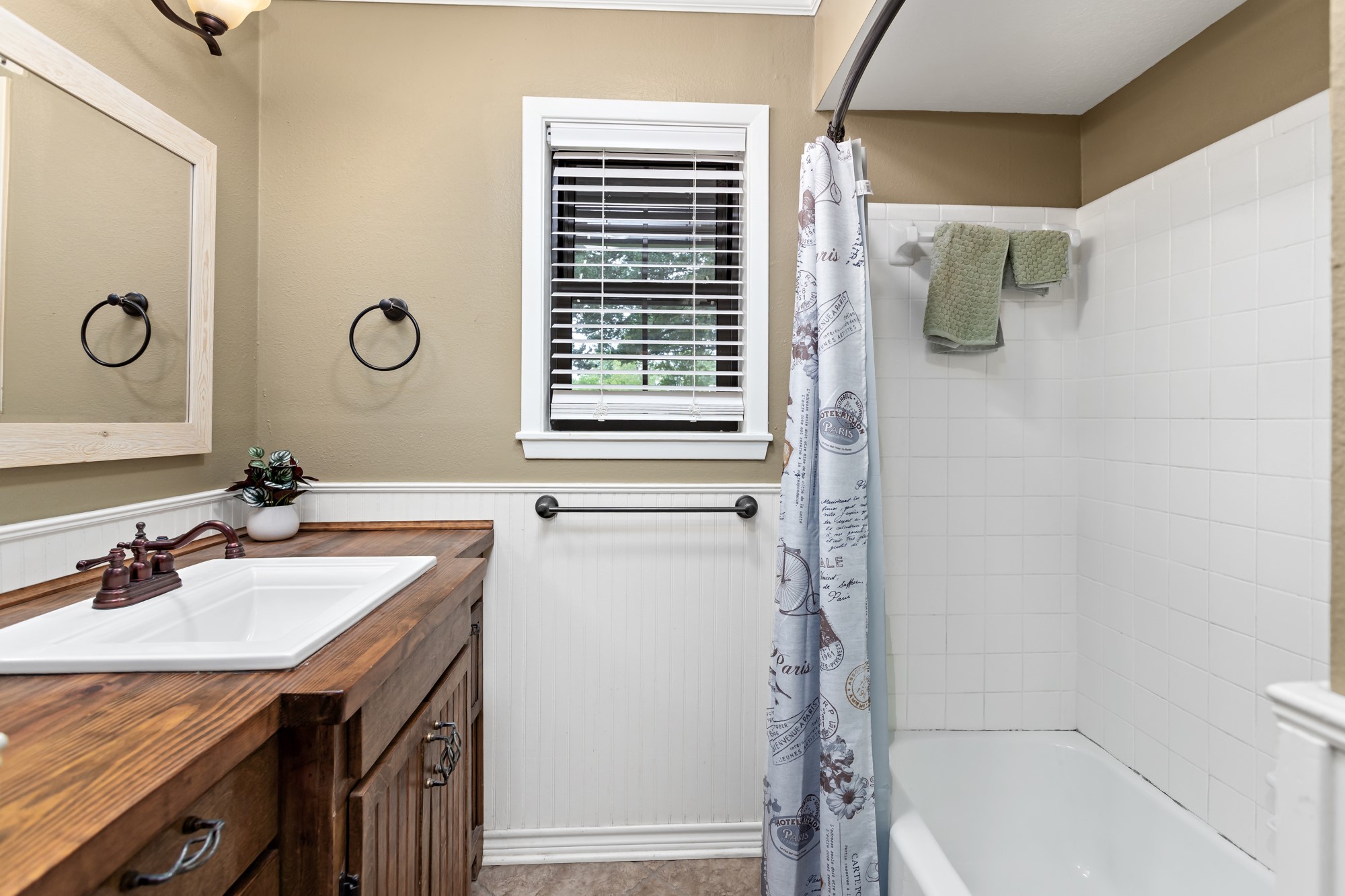 1747 Farm To Market Road 365 Nome, TX 77629 - Photo 19 of 24 a bathroom with a sink a mirror and a shower