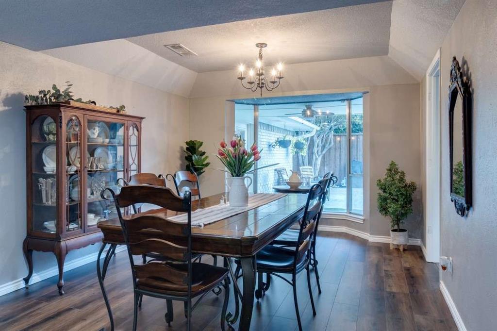 2628 Dalgreen Court Plano, TX 75075 - Photo 6 of 27 a view of a dining room with furniture and chandelier