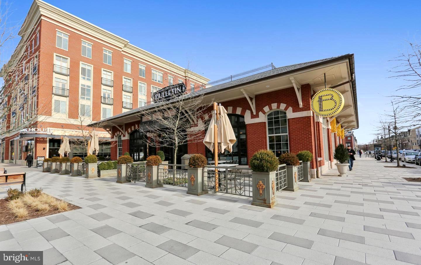 13 Prairie Rose Court Gaithersburg, MD 20878 - Photo 22 of 22 a view of a building with many windows