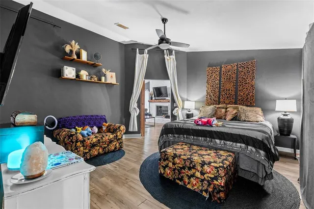 a bed room with furniture and a couch