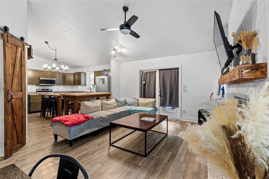 5309 Northeast 60th Avenue High Springs, FL 32643 - Photo 21 of 34 a living room with furniture and kitchen view