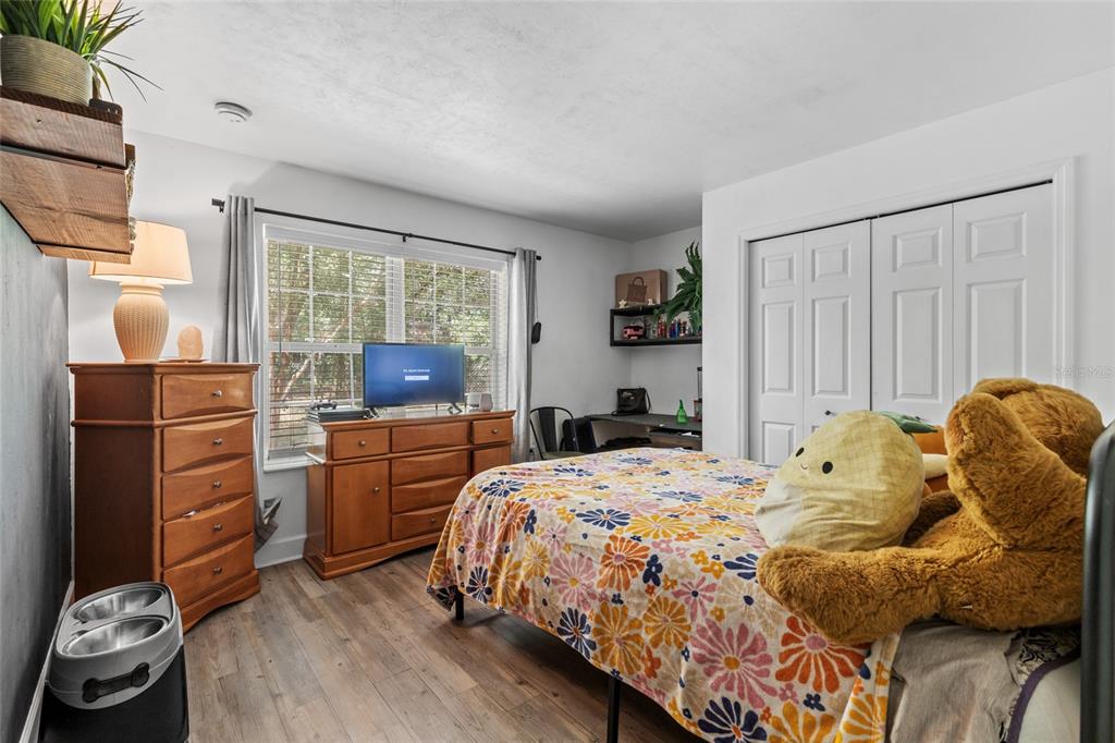 5309 Northeast 60th Avenue High Springs, FL 32643 - Photo 23 of 34 a bedroom with a bed and a window