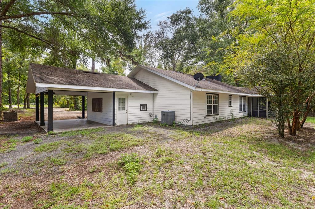 5309 Northeast 60th Avenue High Springs, FL 32643 - Photo 31 of 34 a view of a house with a yard