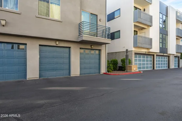a front view of a house with a garage