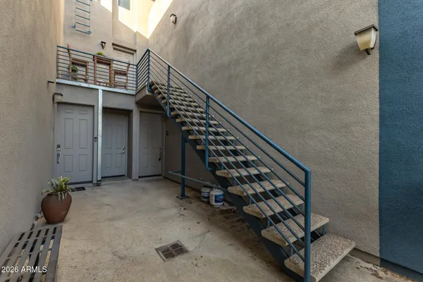 a view of entryway with a front door