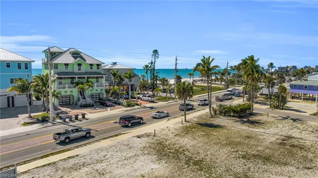 a view of swimming pool with outdoor seating