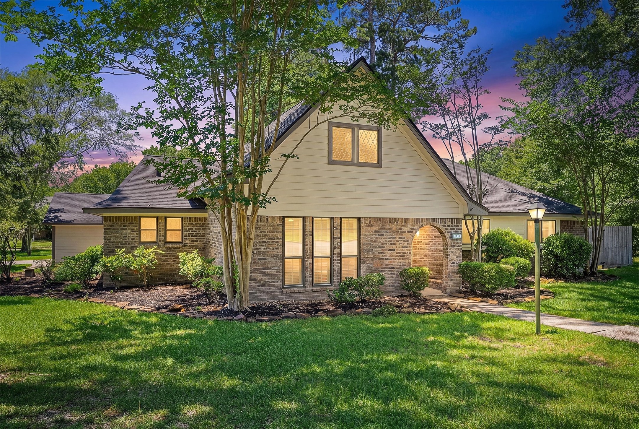 826 North Rivershire Drive Conroe, TX 77304 - Photo 46 of 46 At the end of the day, Rivershire wraps this home in exactly the kind of neighborhood energy that makes people stay for decades. Mature trees, friendly streets, community amenities, and a home with a koi pond, a show stopping kitchen, and a twilight glow that makes it all feel a little like a dream. Come see it in person. You will understand immediately.