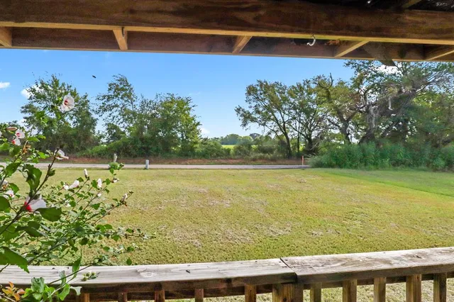 a view of a yard with an outdoor space