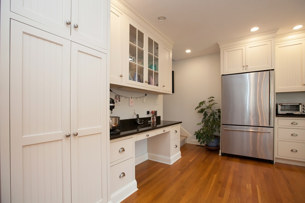 44 Kenneth Road Scituate, MA 02066 - Photo 12 of 30 a kitchen with granite countertop a refrigerator and a sink