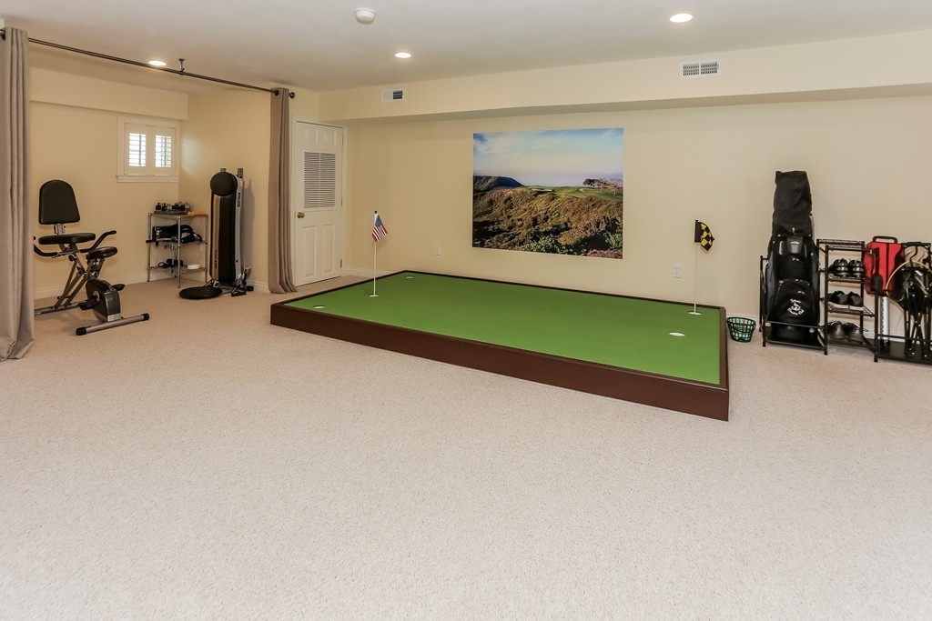 44 Kenneth Road Scituate, MA 02066 - Photo 26 of 30 a living room with furniture and a flat screen tv