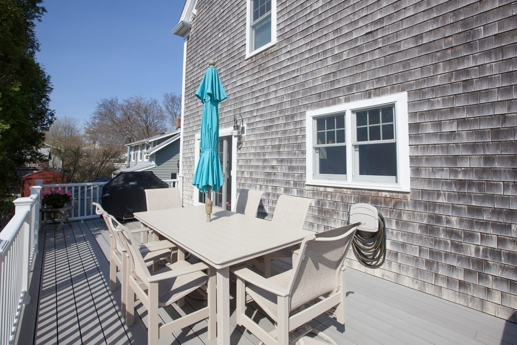 44 Kenneth Road Scituate, MA 02066 - Photo 27 of 30 a view of a patio with table and chairs