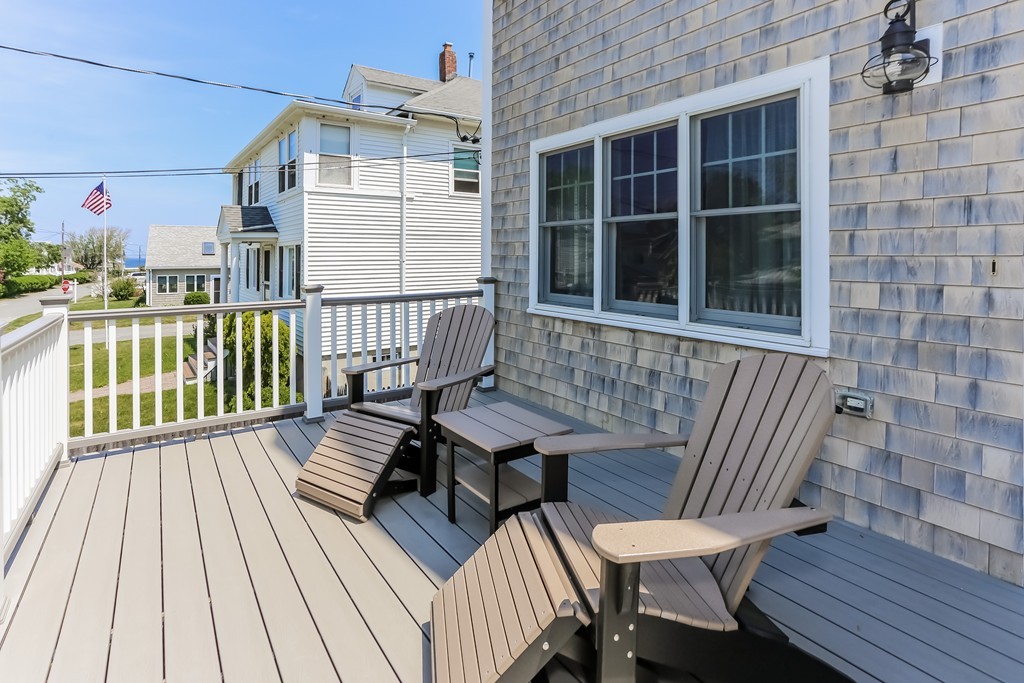 44 Kenneth Road Scituate, MA 02066 - Photo 28 of 30 a view of a wooden chairs on the deck