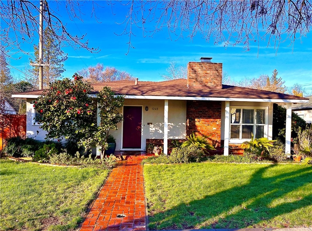 1245 Palm Avenue Chico, CA 95926 - Photo 1 of 19 a view of a house with backyard porch and sitting area