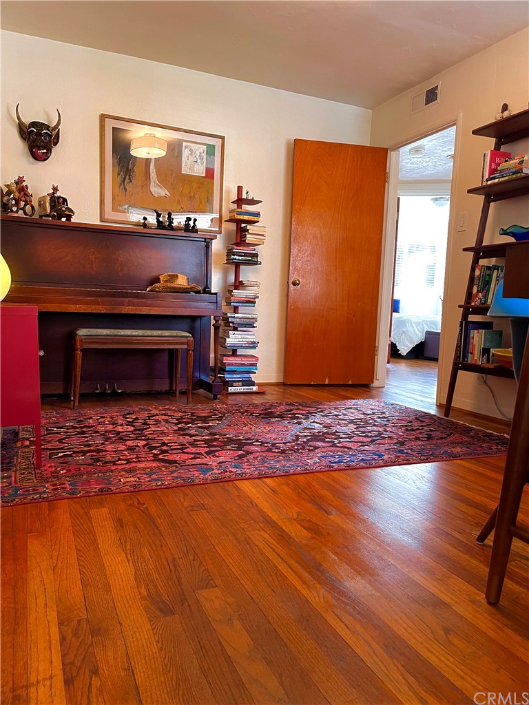1245 Palm Avenue Chico, CA 95926 - Photo 13 of 19 a living room with wooden floor and furniture