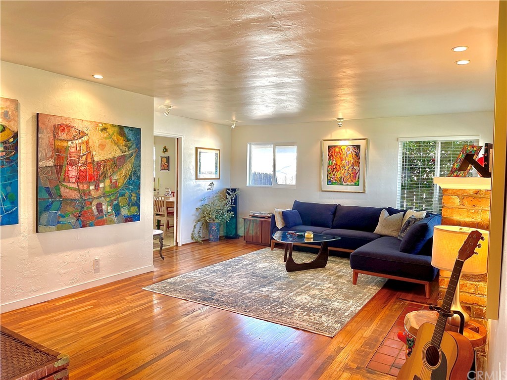 1245 Palm Avenue Chico, CA 95926 - Photo 2 of 19 a living room with furniture and a flat screen tv