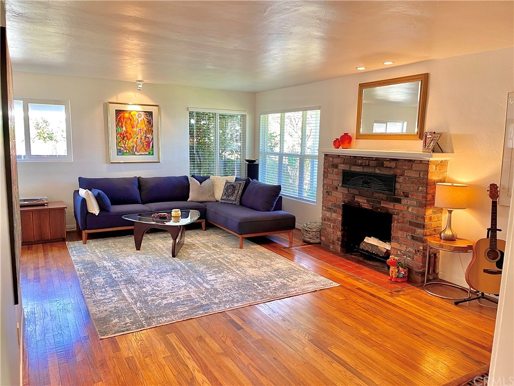 1245 Palm Avenue Chico, CA 95926 - Photo 3 of 19 a living room with furniture and a fireplace