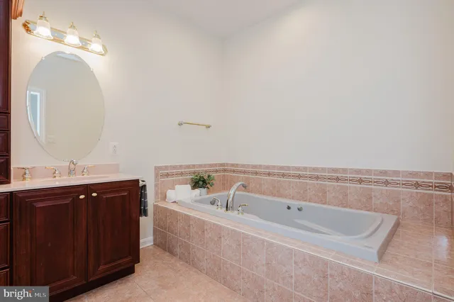 a view of a patio with a table chairs and a backyard