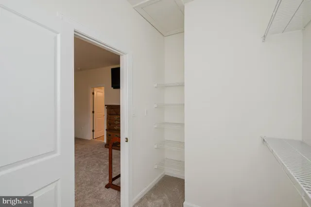 a house with huge green field in front of it