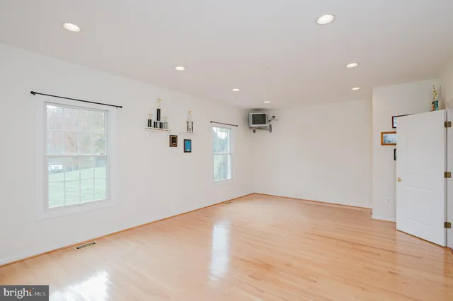 a view of a swimming pool with an outdoor space and seating area