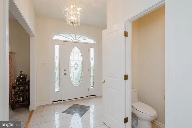 a kitchen with white cabinets