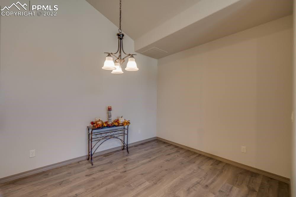 119 Rocchio Drive Florence, CO 81226 - Photo 14 of 48 a workspace room with wooden floor and lounge chair