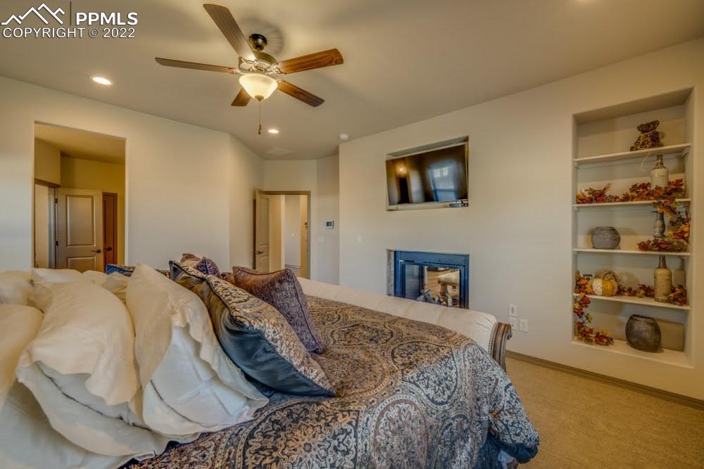 119 Rocchio Drive Florence, CO 81226 - Photo 16 of 48 a bed room with a bed and a television