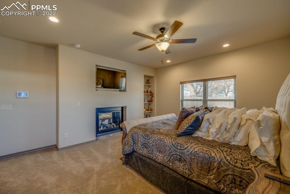 119 Rocchio Drive Florence, CO 81226 - Photo 17 of 48 a bed room with a bed and a television