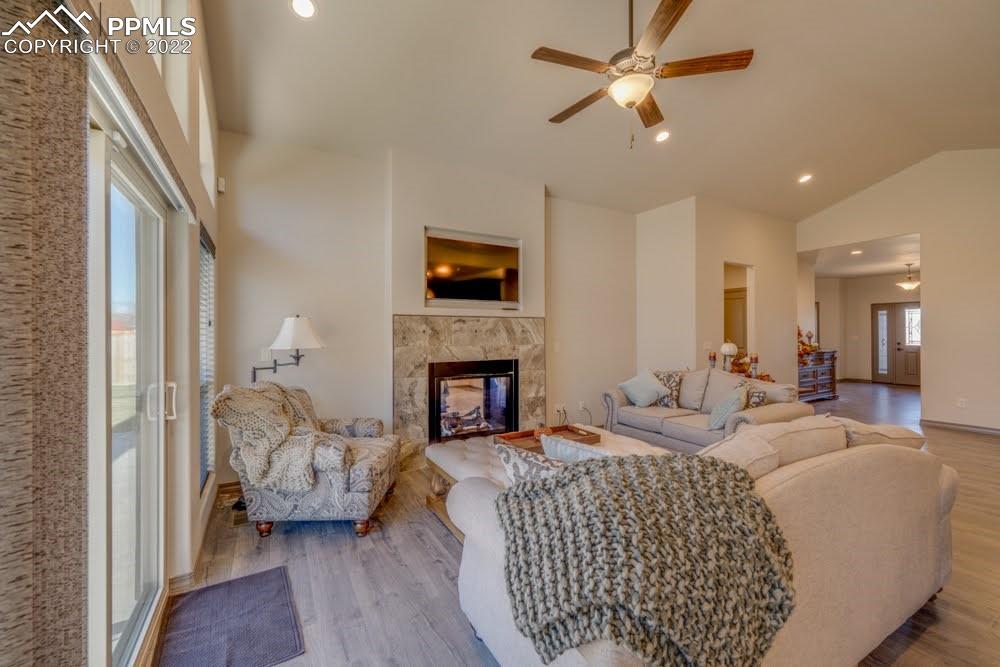 119 Rocchio Drive Florence, CO 81226 - Photo 24 of 48 a living room with furniture fireplace and a flat screen tv