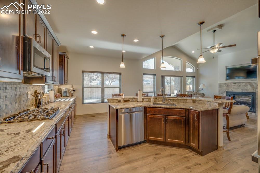 119 Rocchio Drive Florence, CO 81226 - Photo 30 of 48 a kitchen with lots of counter top space and stainless steel appliances